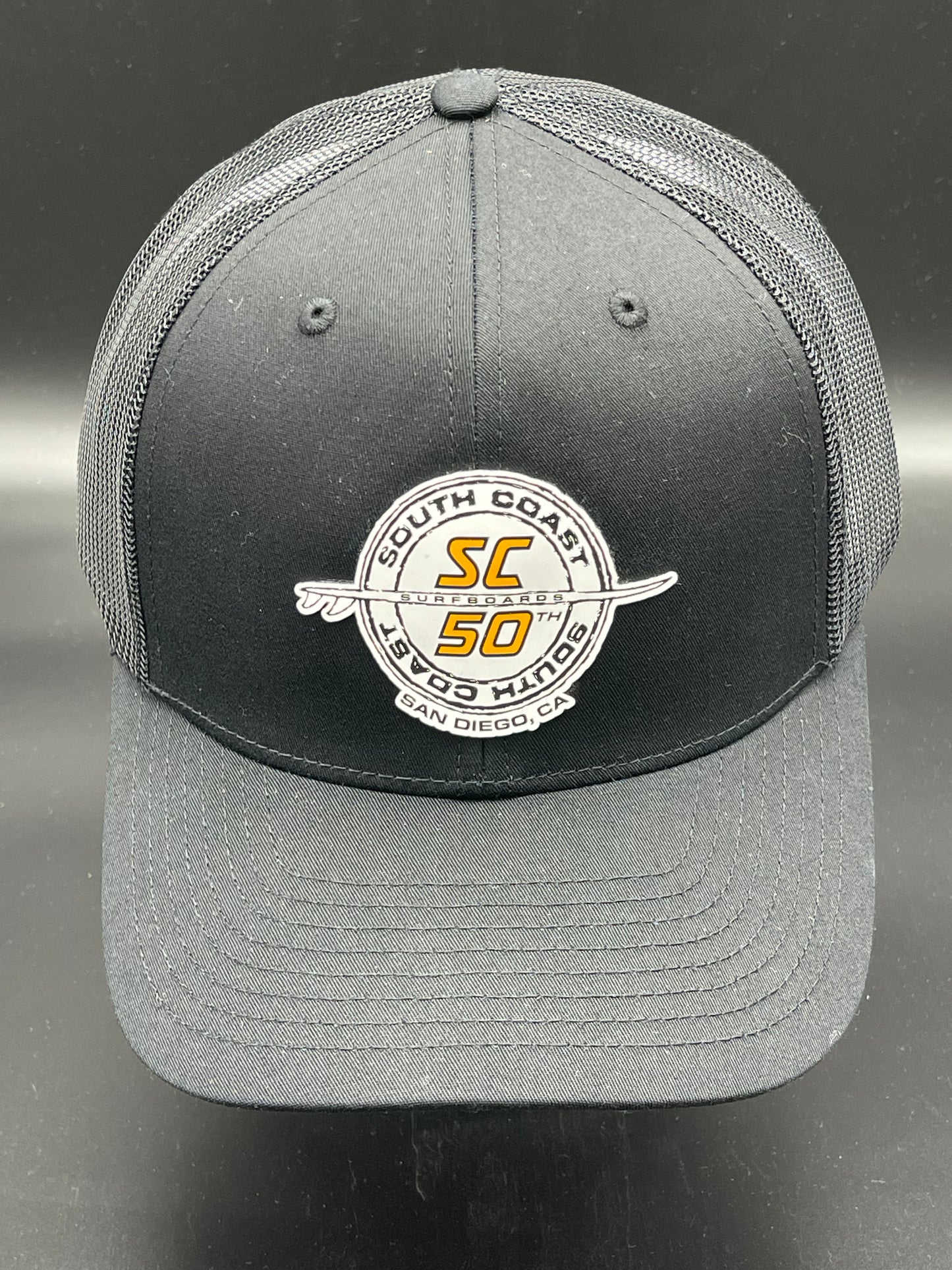 South Coast Adult 50th Trucker Hat Black