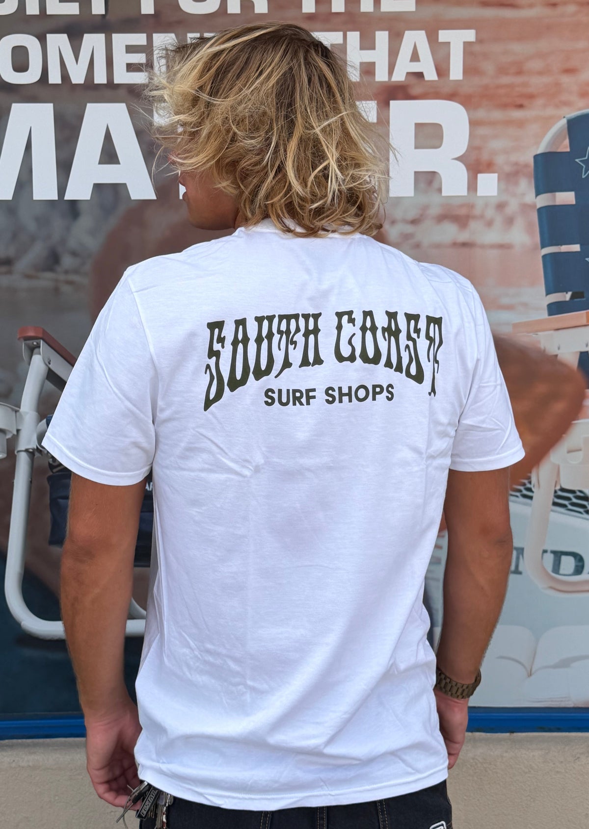 South Coast Surf Shops white graphic tee back view with large black South Coast logo
