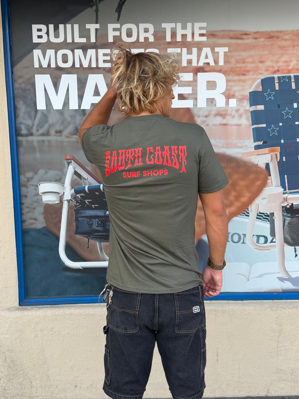 Men's South Coast Drip Tee in Olive with red dripping-style South Coast Surf Shops back graphic and short sleeves.