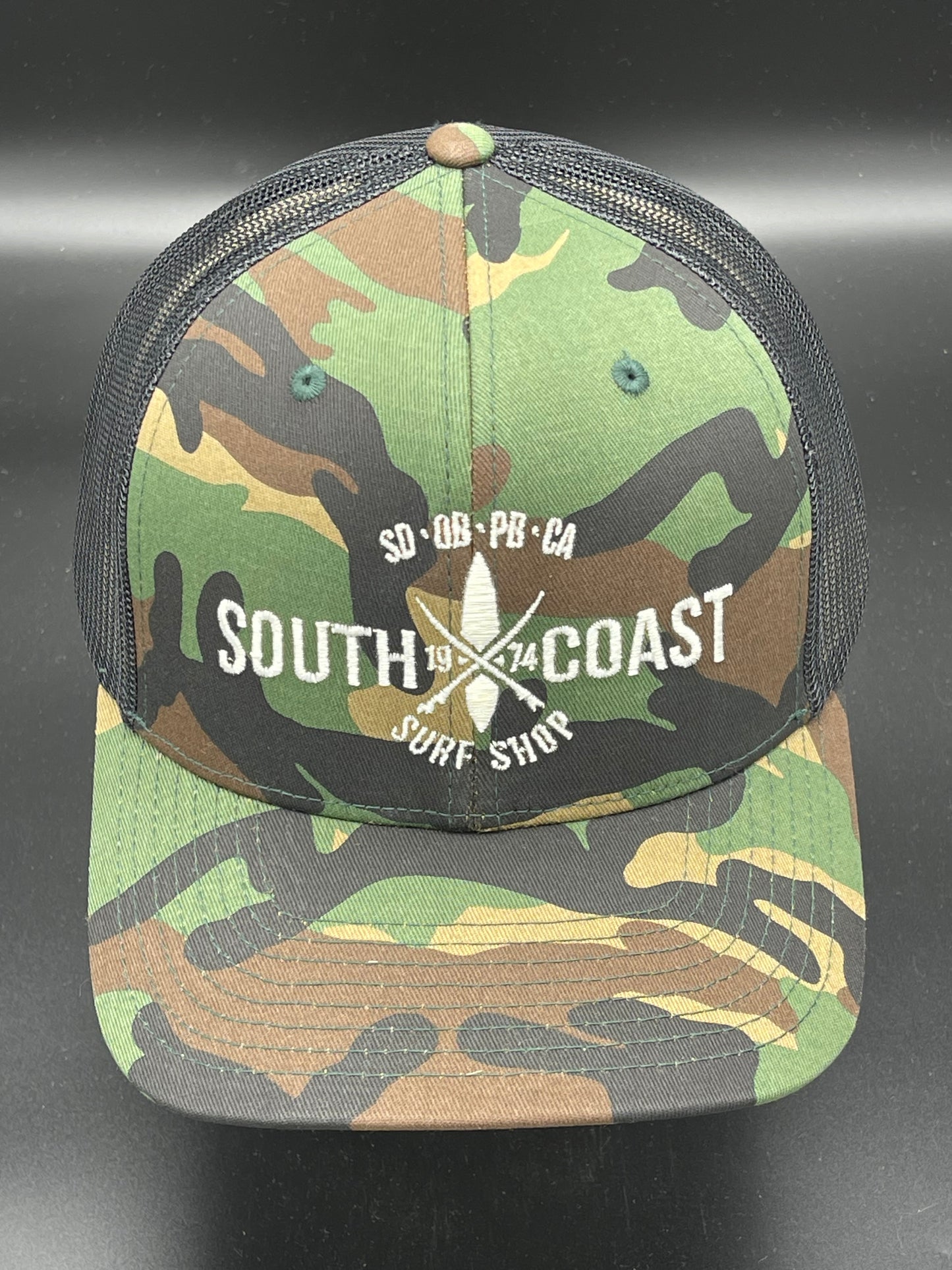 South Coast Adult Cross Logo Trucker Hat CAMO