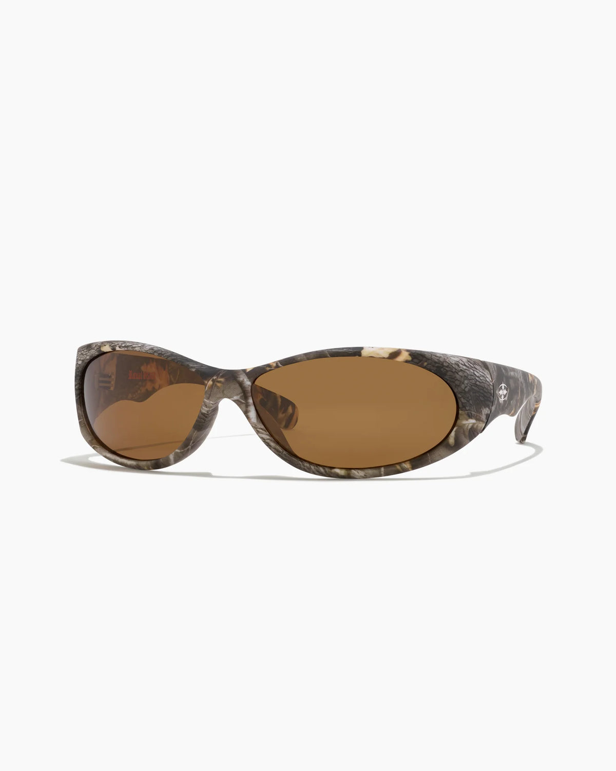 Demon Speed Camo Sunglasses with brown lenses, durable camouflage-patterned frame, and signature logo on the temple, shown from a three-quarter angle.