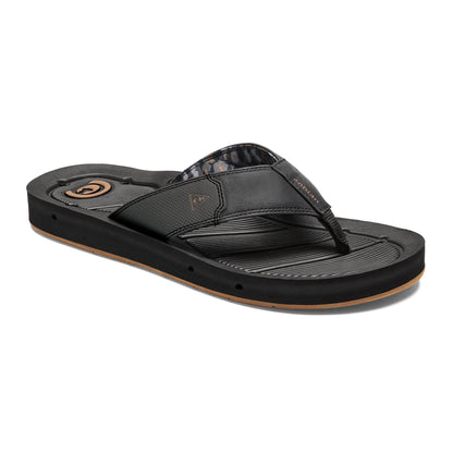 Cobian Draino 3 Midnight Flip Flop angled view featuring black contoured footbed, textured black straps, patterned lining and tan rubber outsole
