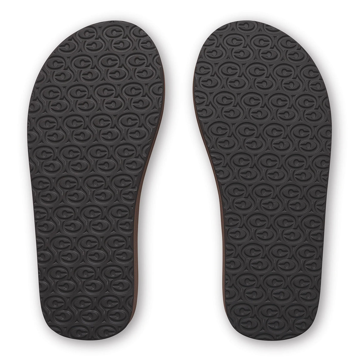 Bottom view of Cobian Dunes men's flip flops featuring black rubber outsoles with a repeating Cobian logo tread pattern.
