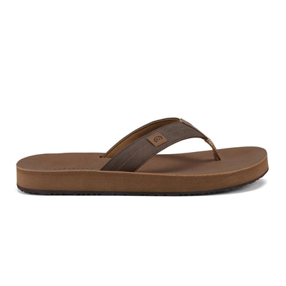 Side view of Cobian Dunes Brown men's sandals showcasing a cushioned brown footbed, padded thong strap with contrast stitching, and black rubber outsole.