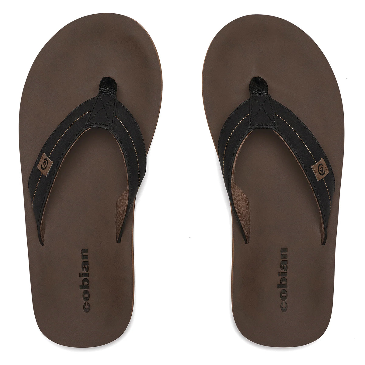 Top view of Cobian Dunes flip flops in Chocolate showing brown footbeds with Cobian branding, black V-shaped straps, and contrast stitching.