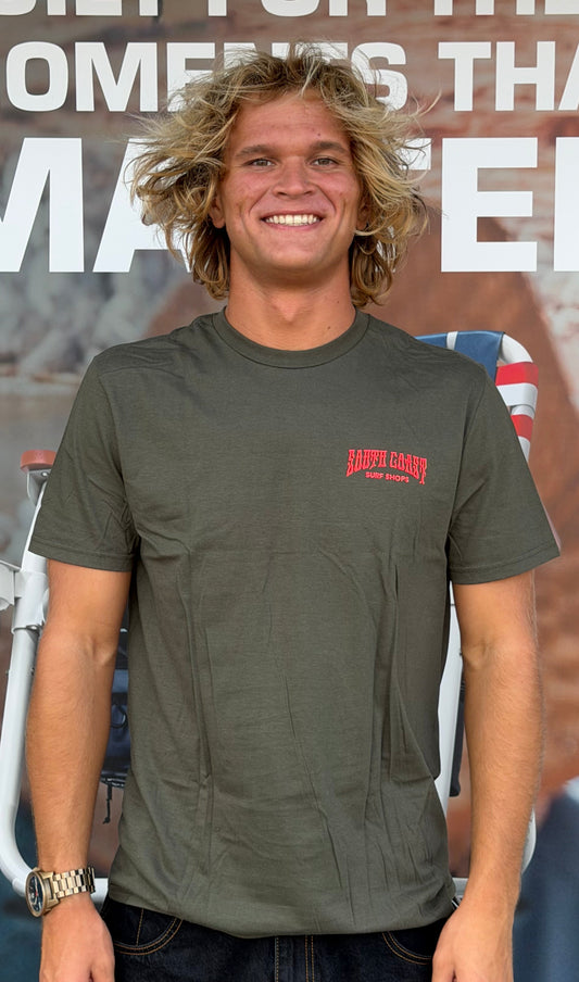 South Coast Drip Tee in Olive featuring a small red South Coast Surf Shops chest logo, crew neckline, and short sleeves.