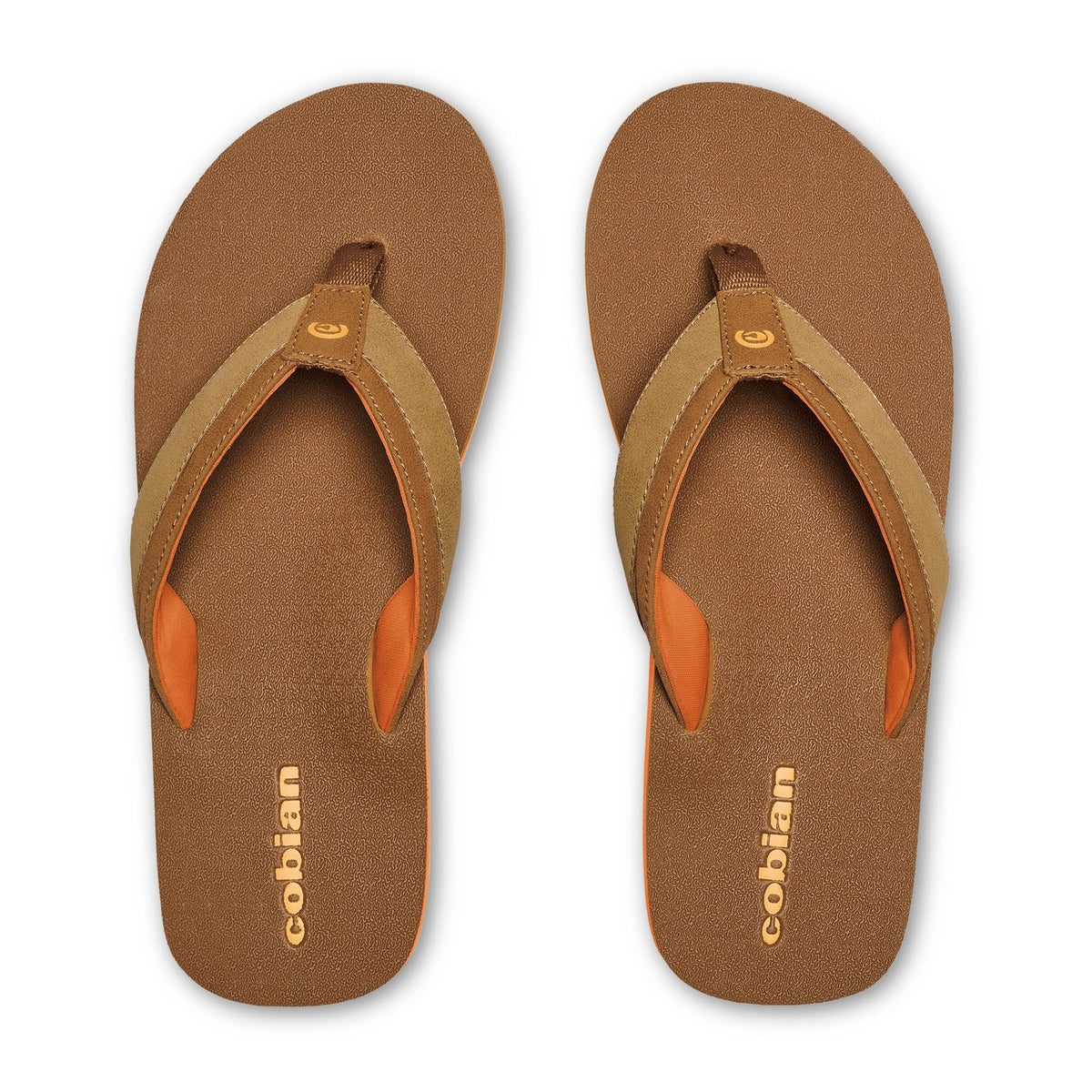 Cobian Foamie Brown Flip Flops top view featuring tan and brown straps, orange padded lining and Cobian branding on textured brown footbeds