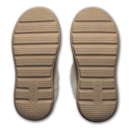 Cobian Frothy slippers in Tan featuring textured brown outsoles with horizontal traction grooves, wave-pattern detailing, and Cobian branding.