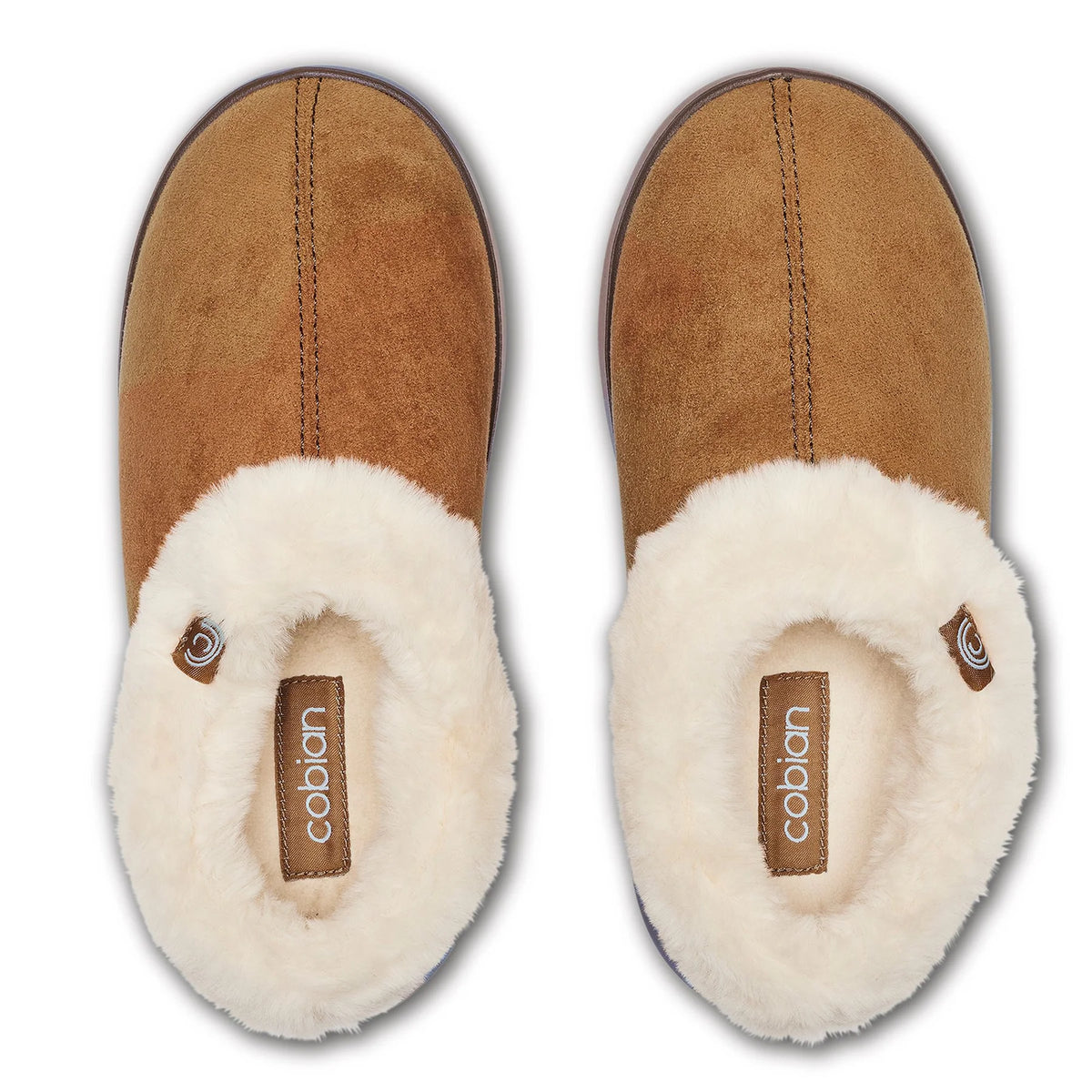 Top view of Cobian Frothy slippers in Tan showing soft brown uppers, plush cream faux fur interiors, and Cobian branded footbeds.