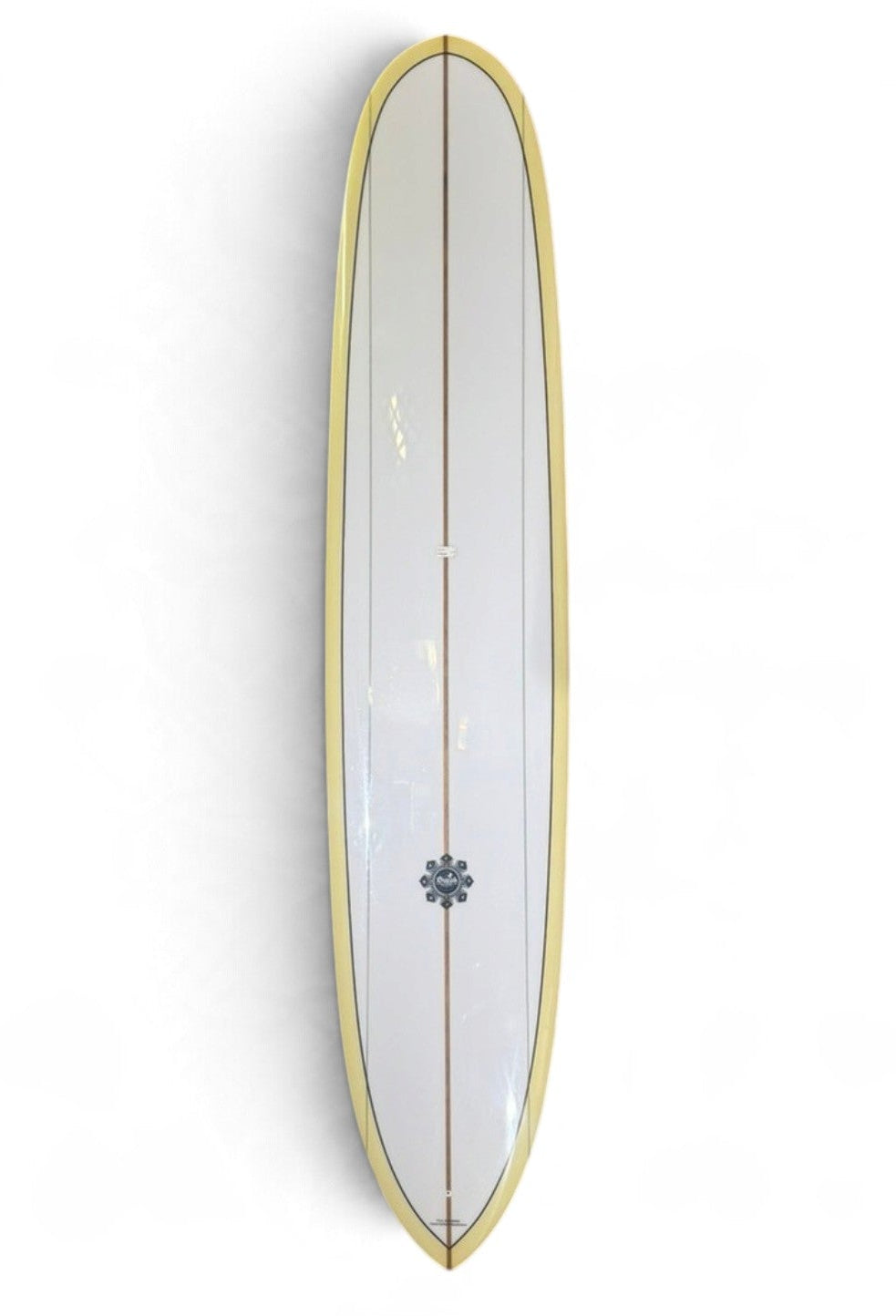 A white 9'2 Hank Byzak with tan rales with a flower emblem toward the bottom of the board. 
