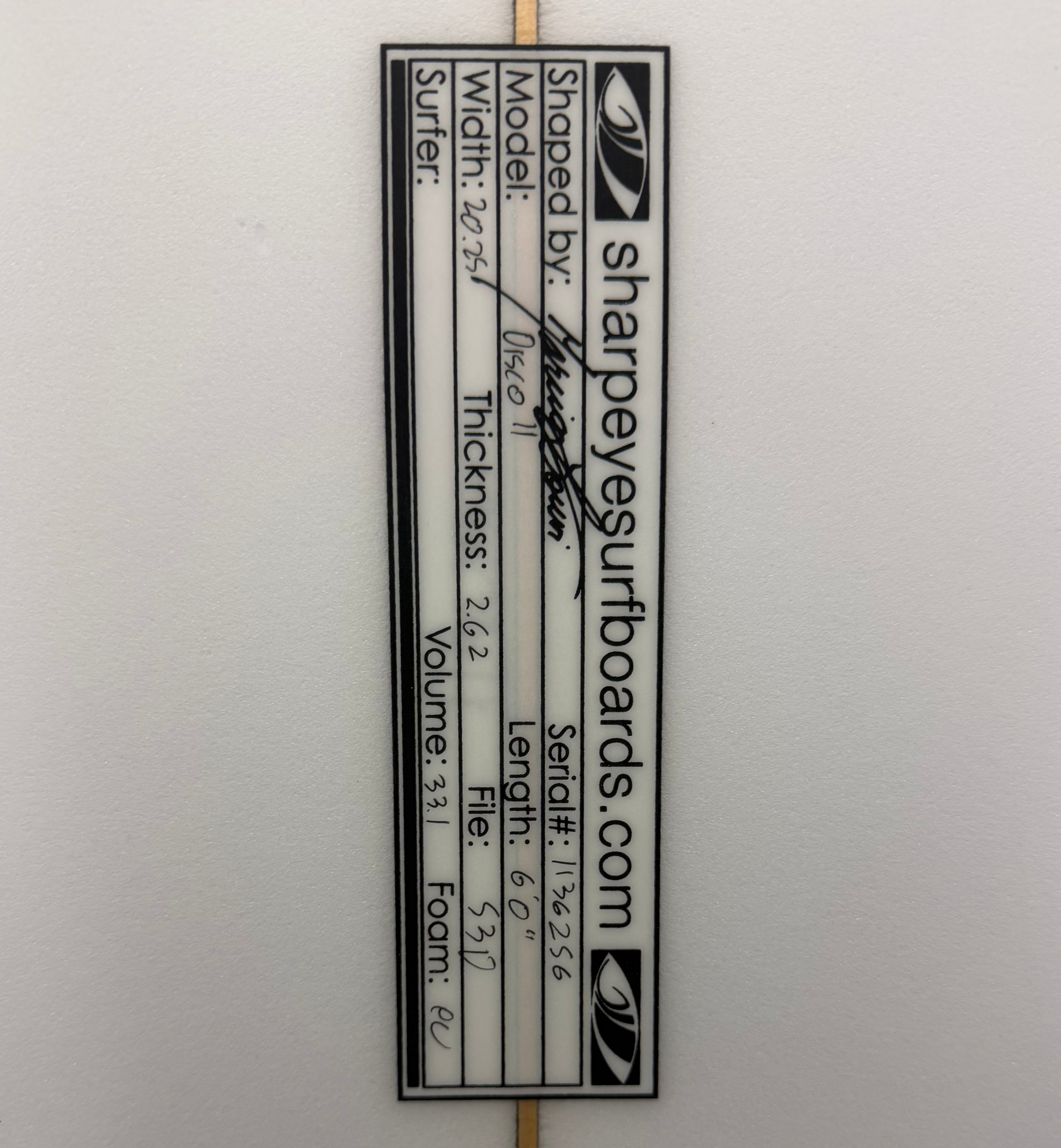 Dimensions of a white Sharpe eye surfboard. 