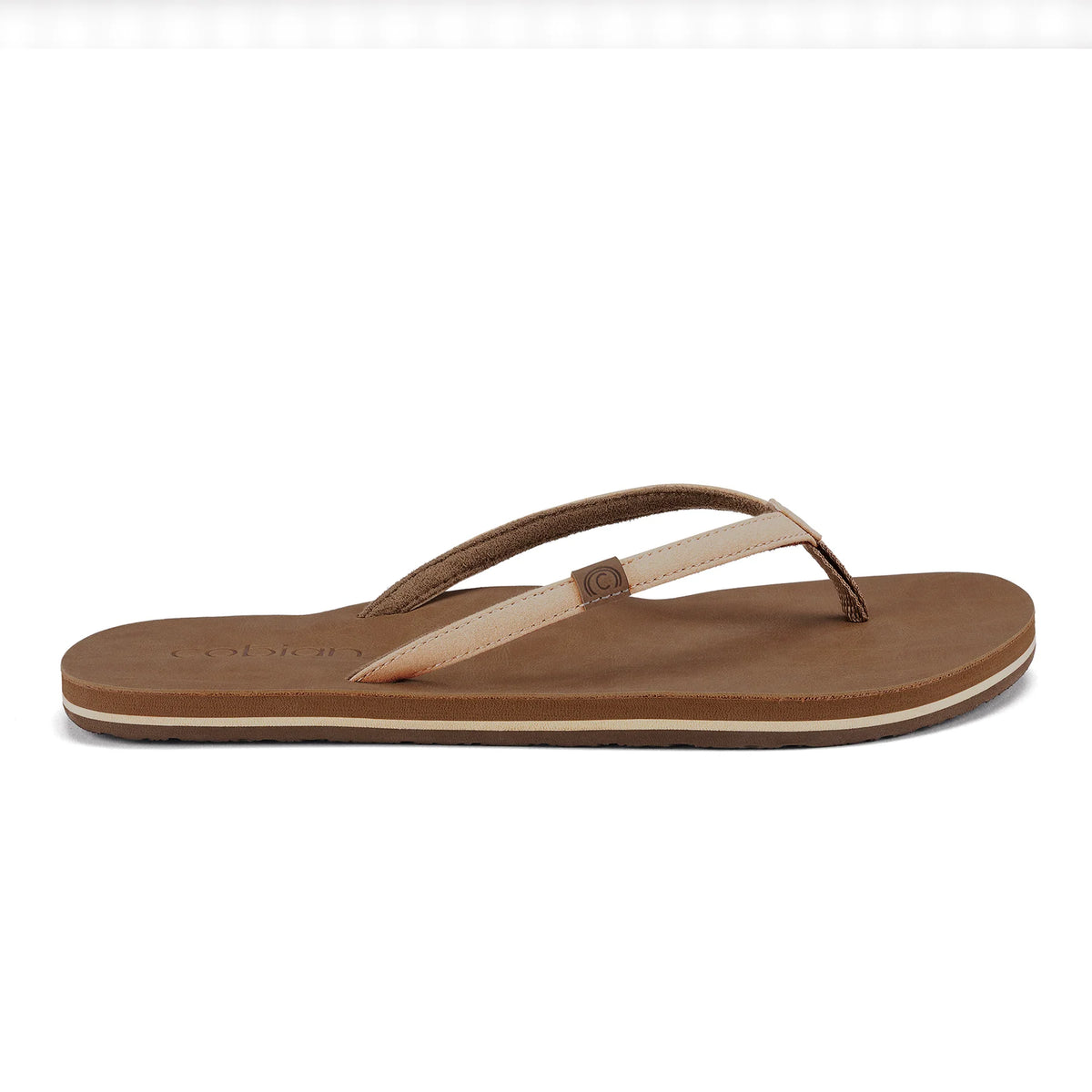 Side view of Cobian Kaia Flip Flop in Cream highlighting its slim straps, brown footbed, and low-profile sole with cream accent stripe.