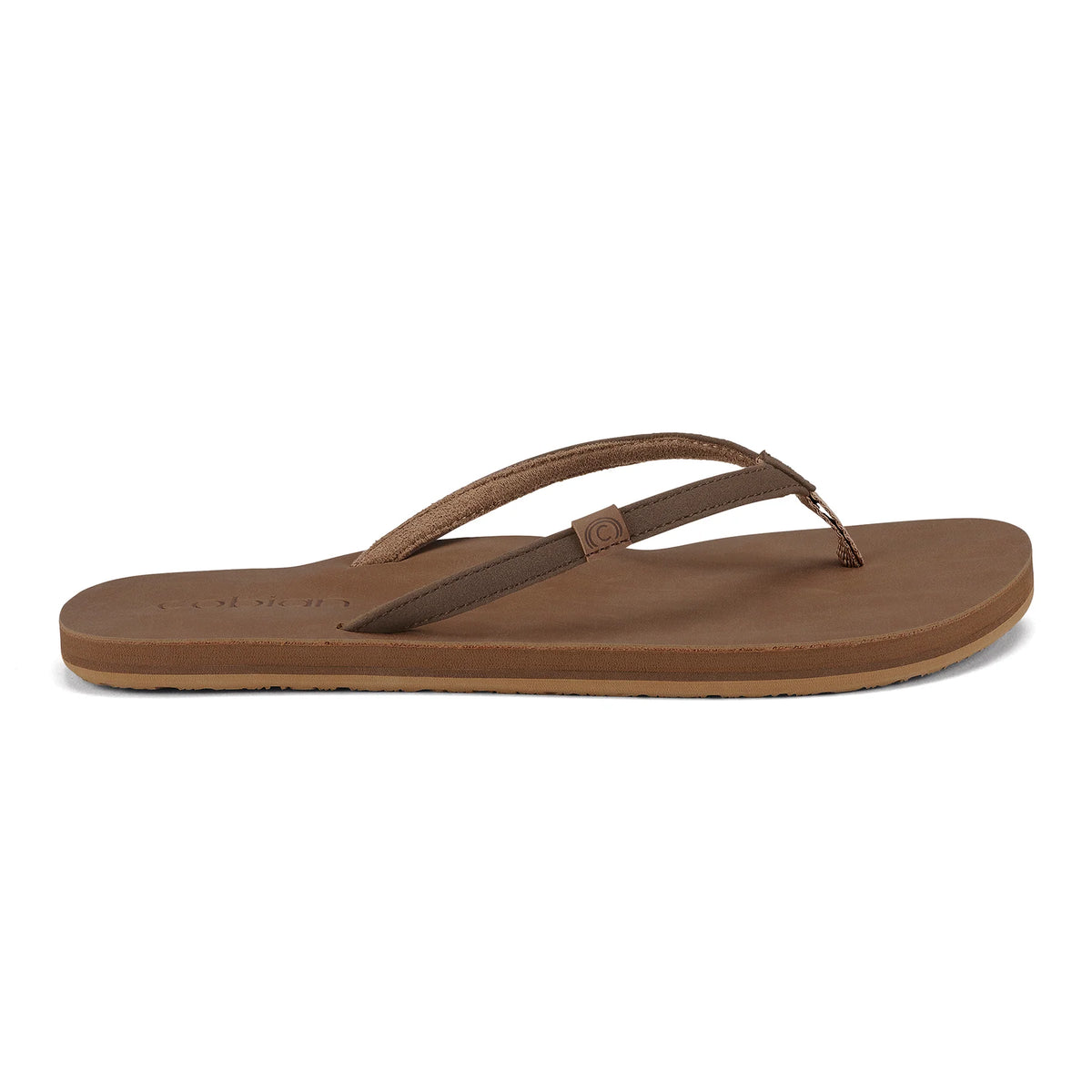 Side view of Cobian Kaia Flip Flop in Mocha highlighting its slim stitched straps, brown footbed, and low-profile tan rubber outsole.