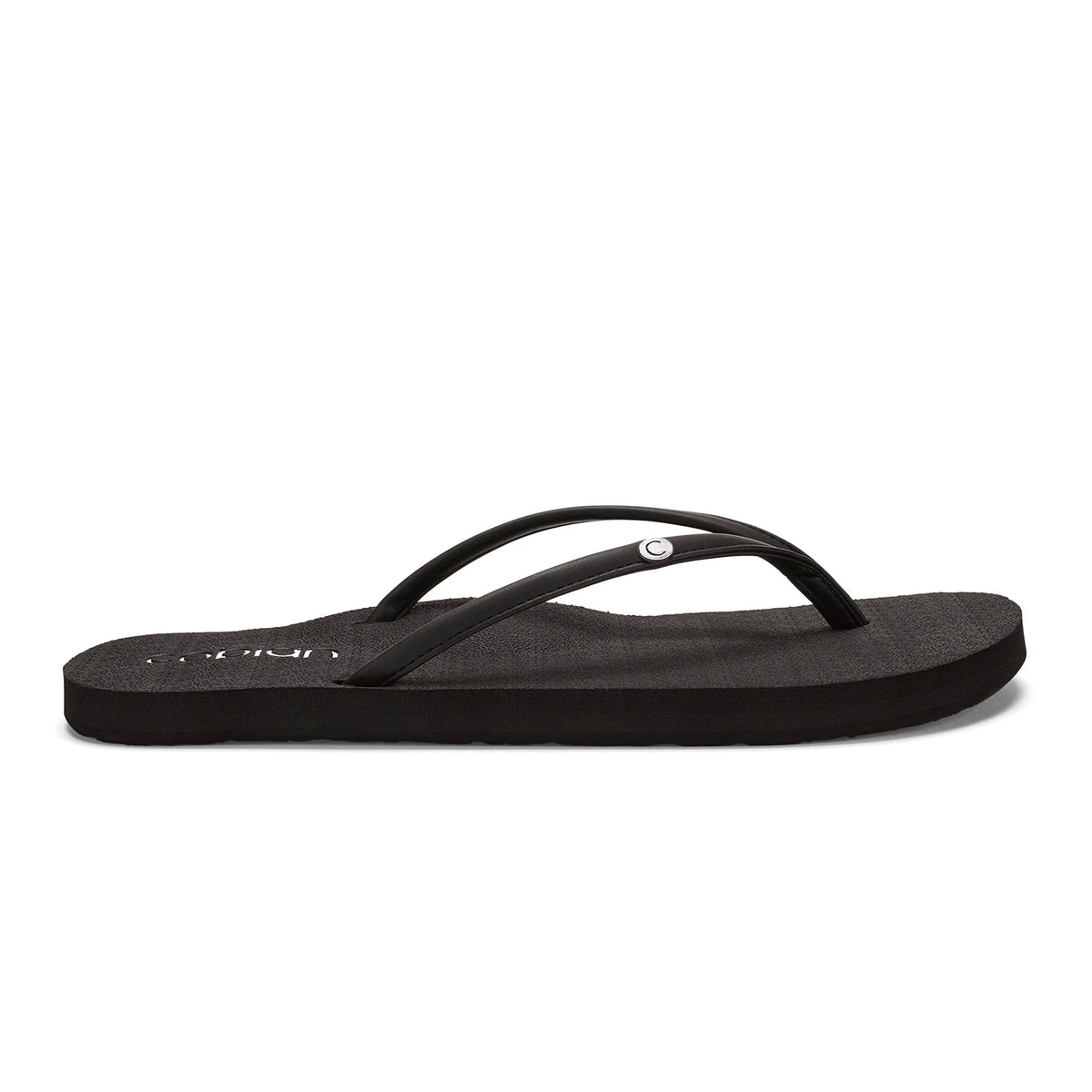 Side view of Cobian Nias Bounce 2 black flip flops showing a low-profile sole, slim black straps, and a silver Cobian logo detail.