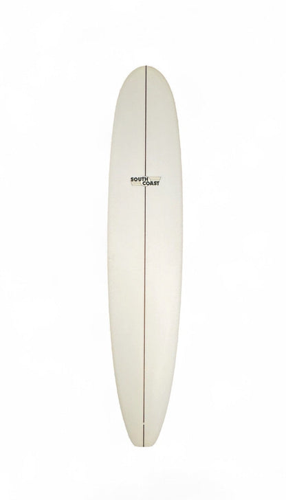 The front of a white South Coast longboard. With a South Coast logo toward the top of the board. 