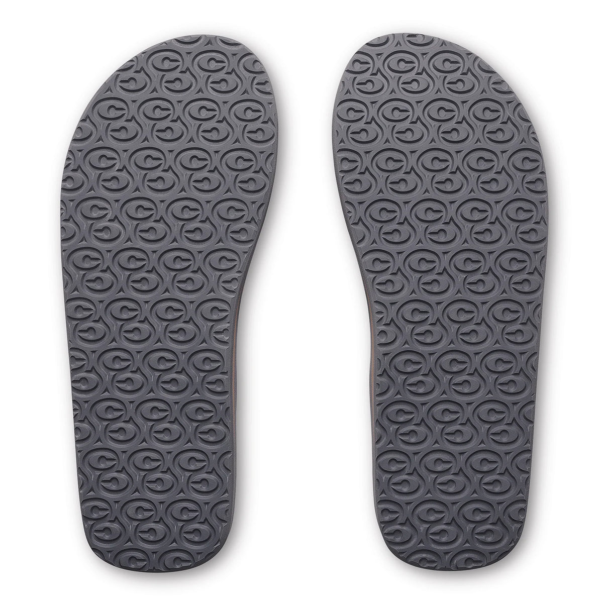 Cobian Salty Flip Flops in Charcoal featuring textured rubber outsoles with a repeating Cobian logo traction pattern.