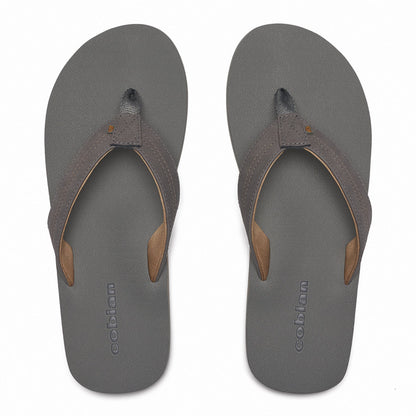 Top view of Cobian Salty Flip Flops in Charcoal showing textured gray footbeds, padded thong straps, tan lining, and Cobian branding.