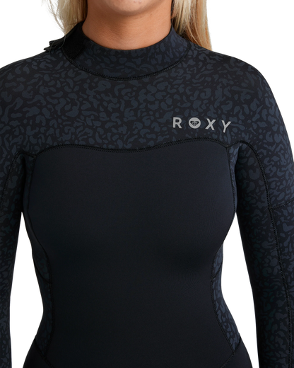 Roxy women’s wetsuit chest detail with Roxy logo and animal print panels
