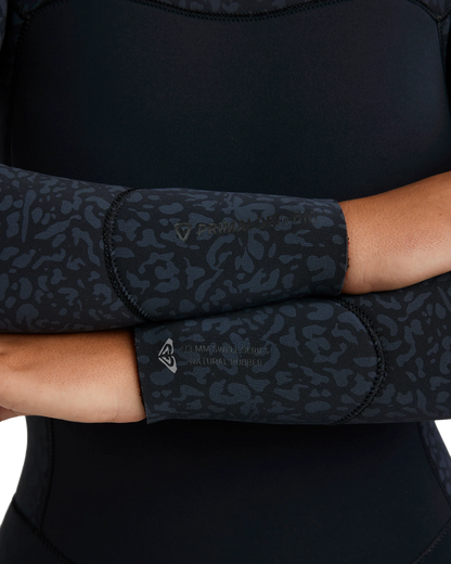 Roxy women’s wetsuit wrist cuff details with animal print and branding