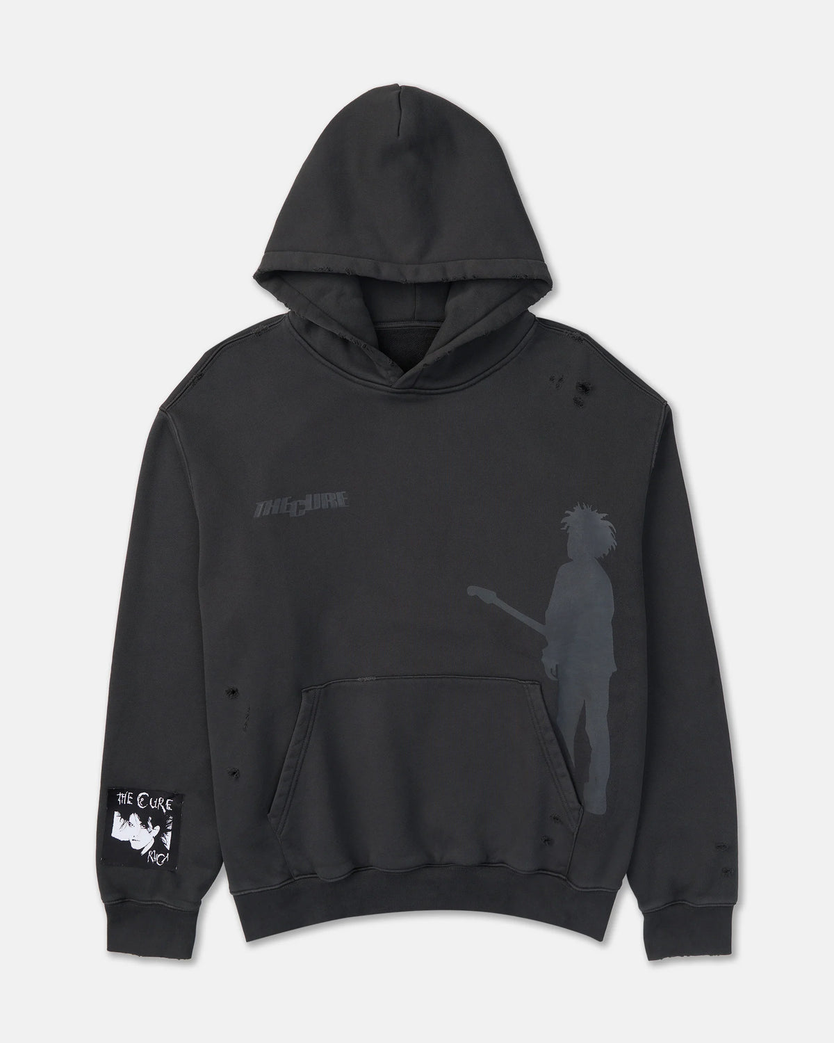 The Cure Hoodie in washed black featuring subtle band graphics, a guitarist silhouette, distressed detailing, kangaroo pocket, and The Cure sleeve patch.