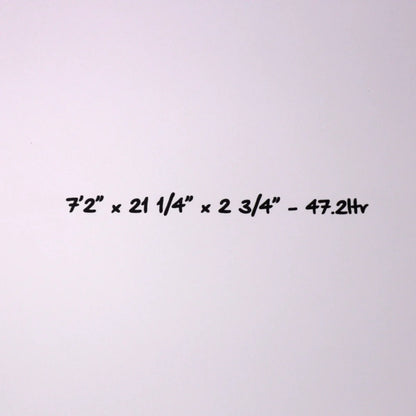 A white wall or background with black handwritten text reading “7'2” x 21 1/4” x 2 3/4” - 47.2 hr”.
