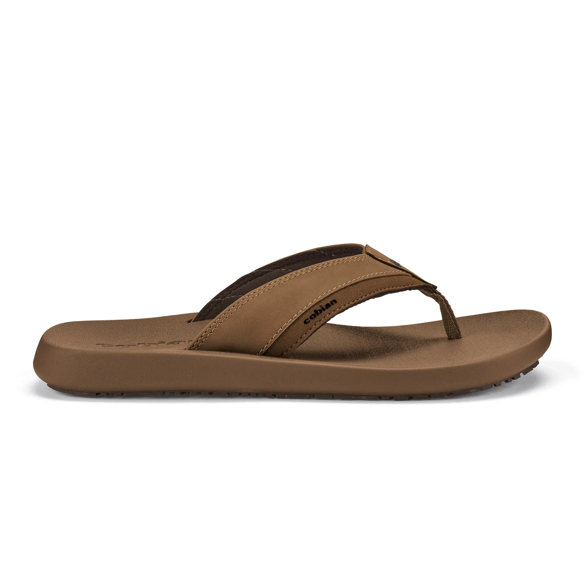 Side profile of Cobian Venture Men's Flip Flops in Tan highlighting the cushioned sole, padded synthetic straps, contrasting stitching, and textured outsole.